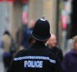 Police officer in busy street