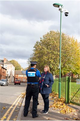 Commissioner Henry and the City Burglary Reduction Officer with new CCTV camera installation