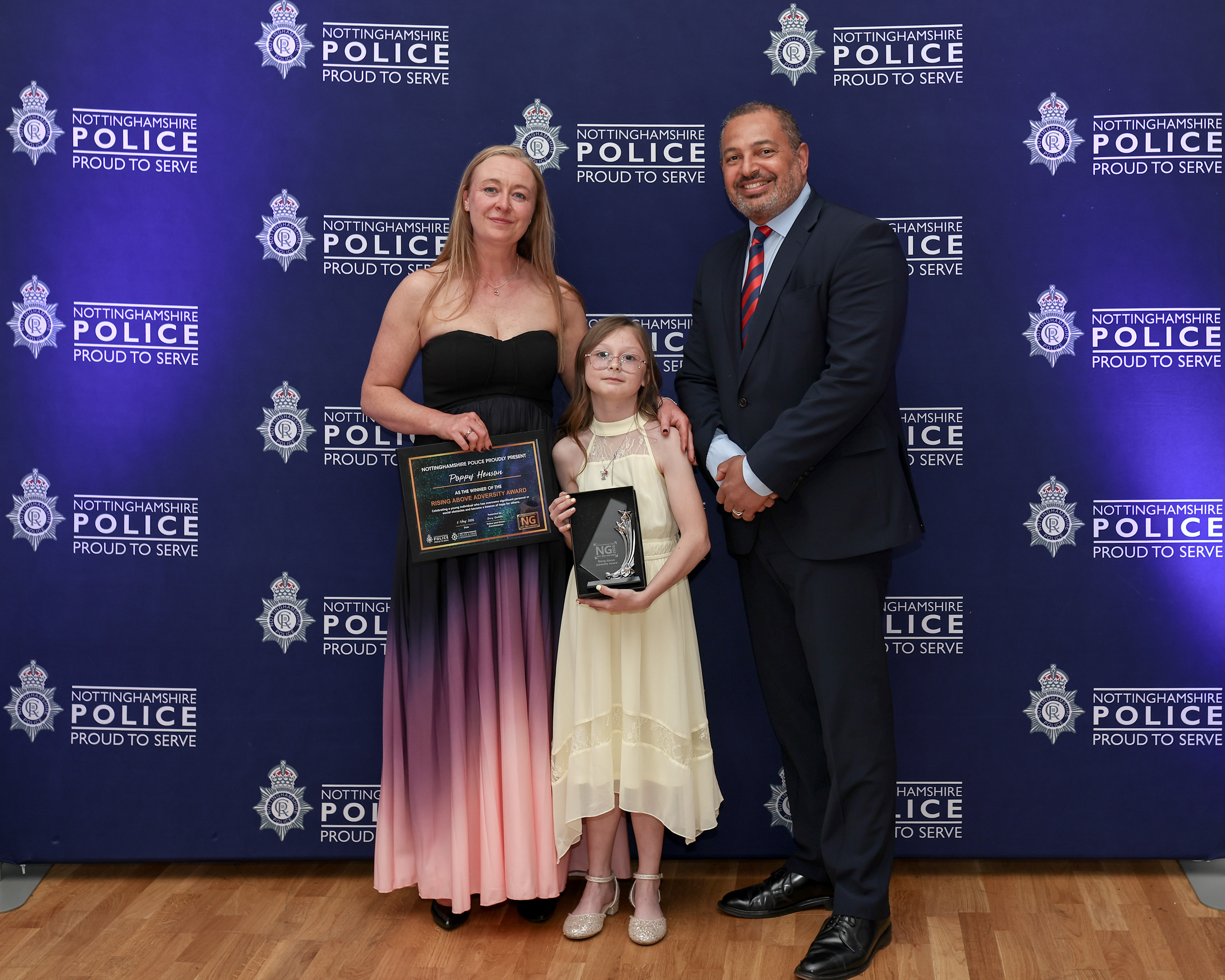 PCC Gary Godden presents the Rising above Adversity Award to Poppy Henson