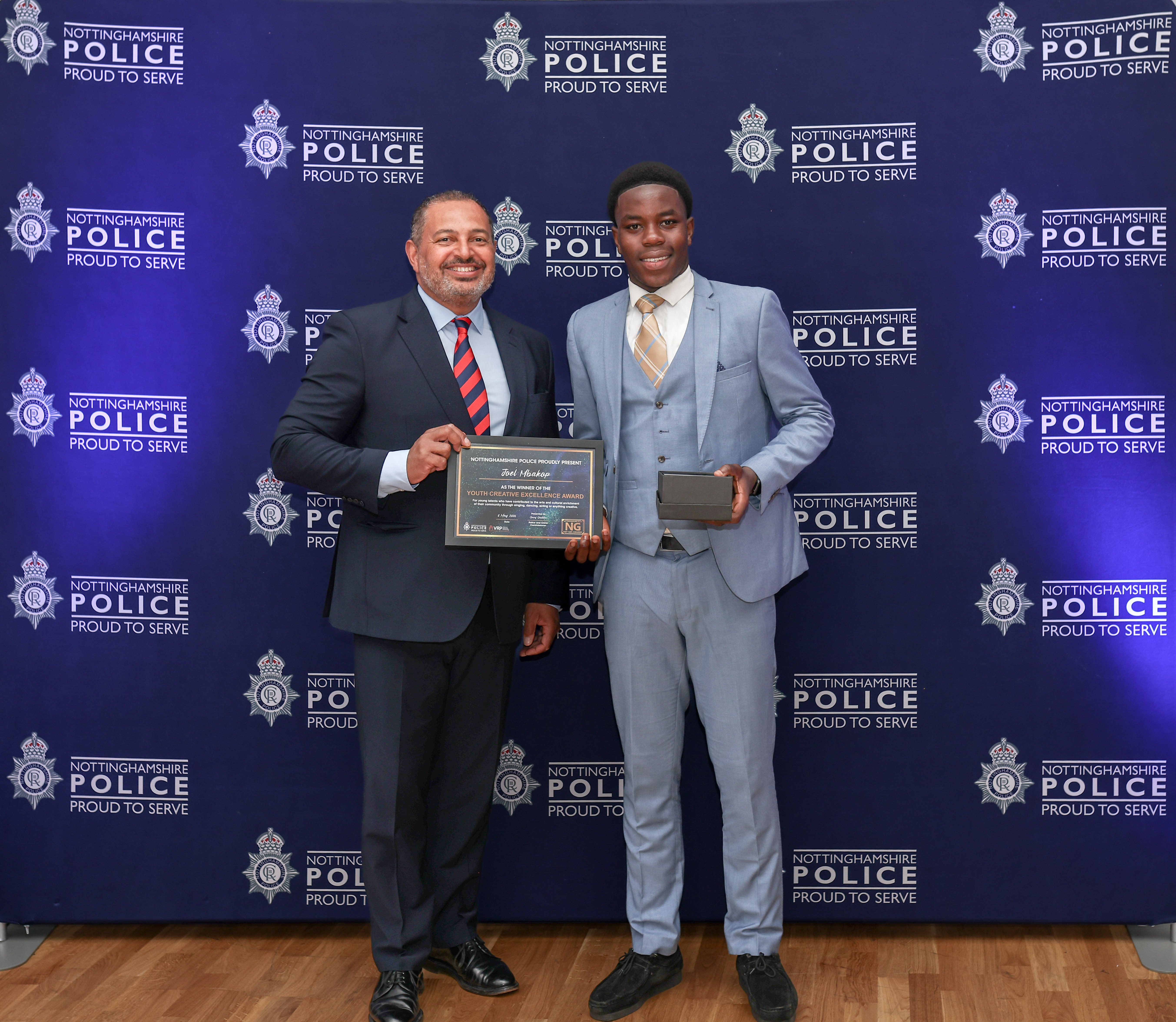 PCC Gary Godden presents the Creative Youth Excellence award to Joel Mbakop