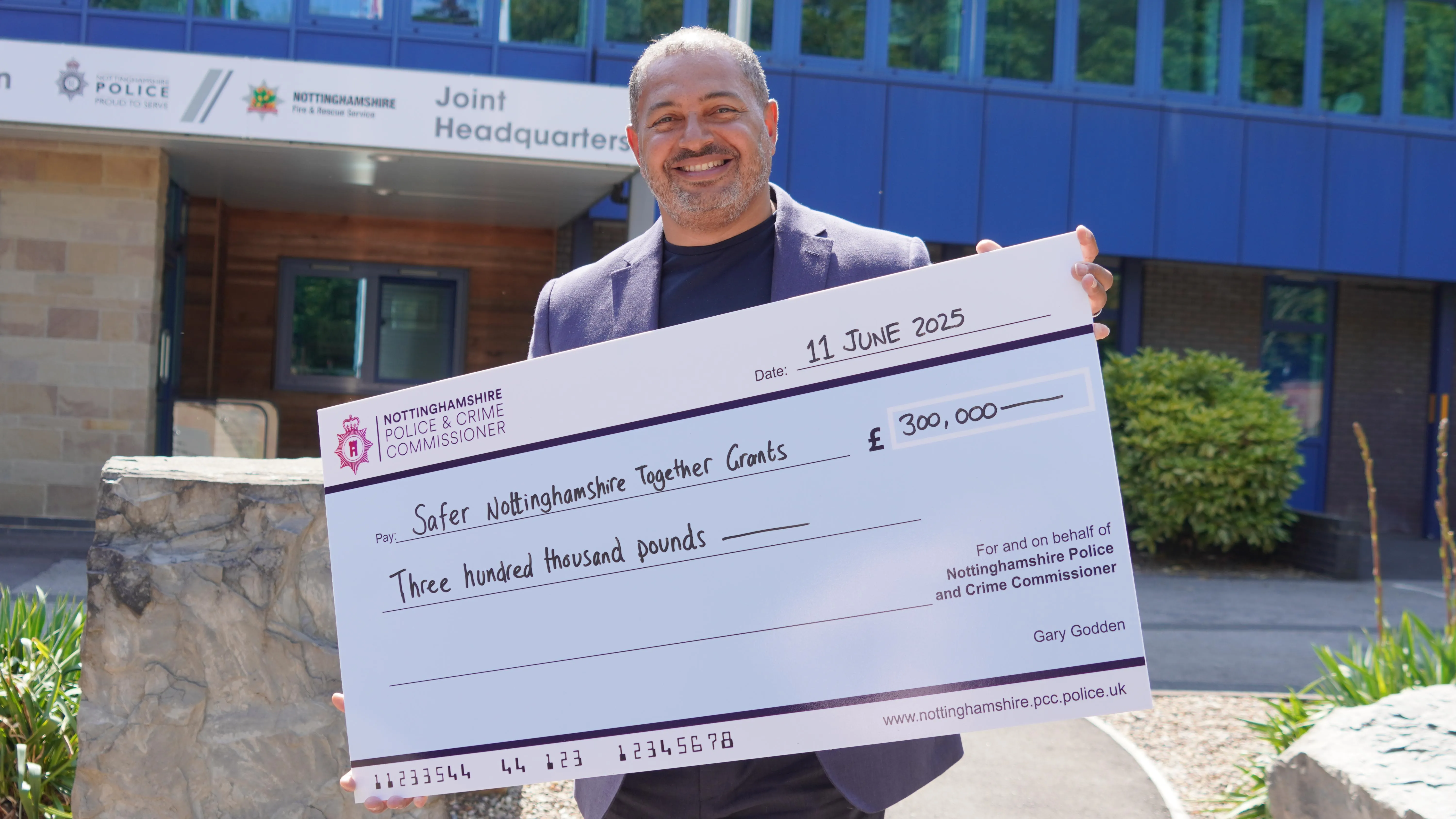PCC Gary Godden with a cheque