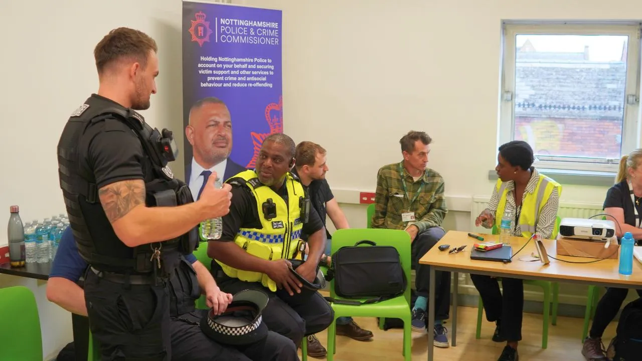 Officers and partners in Hyson Green Asda discussing antisocial behaviour