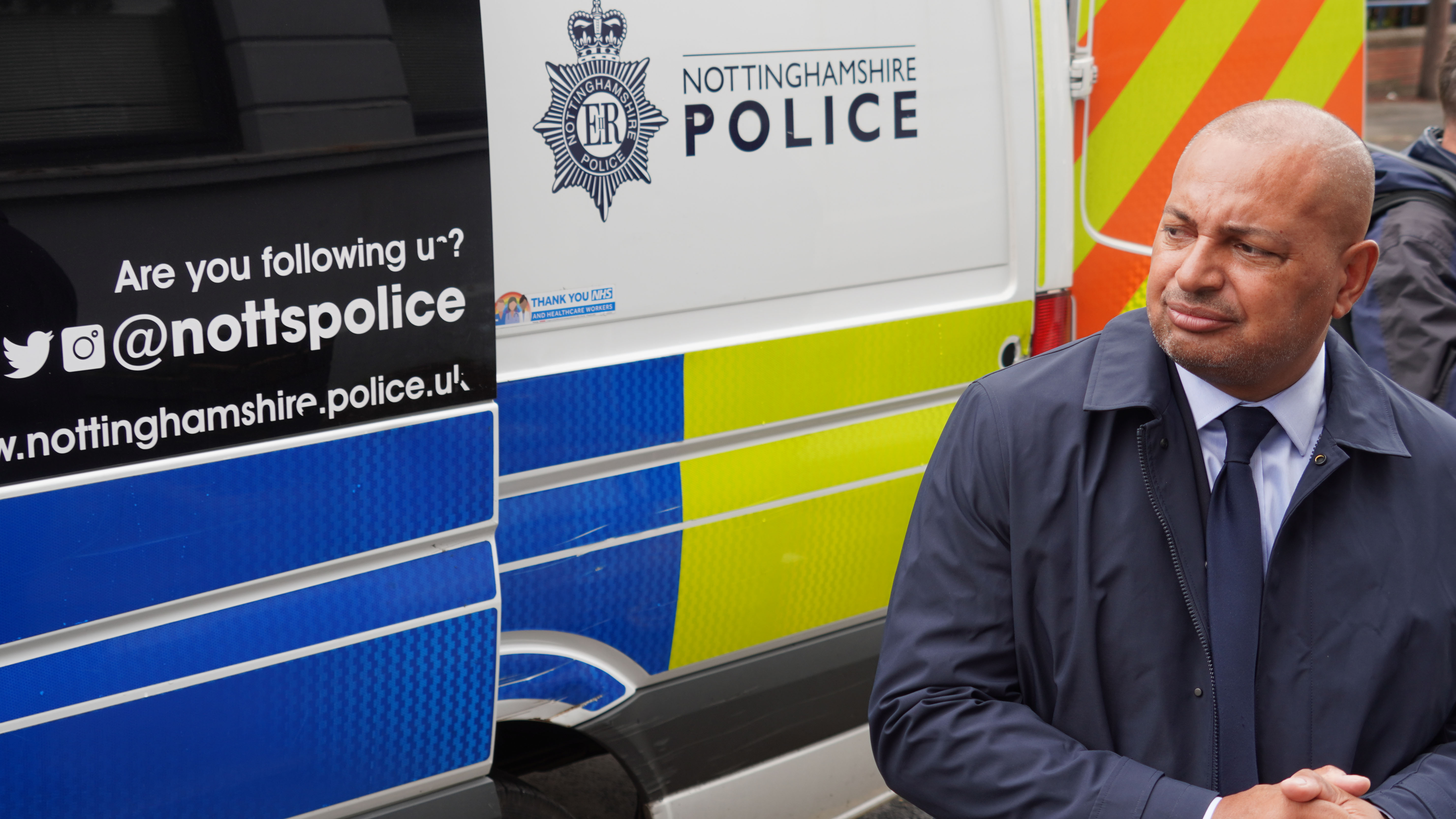 PCC Gary Godden in front of a Nottinghamshire Police van