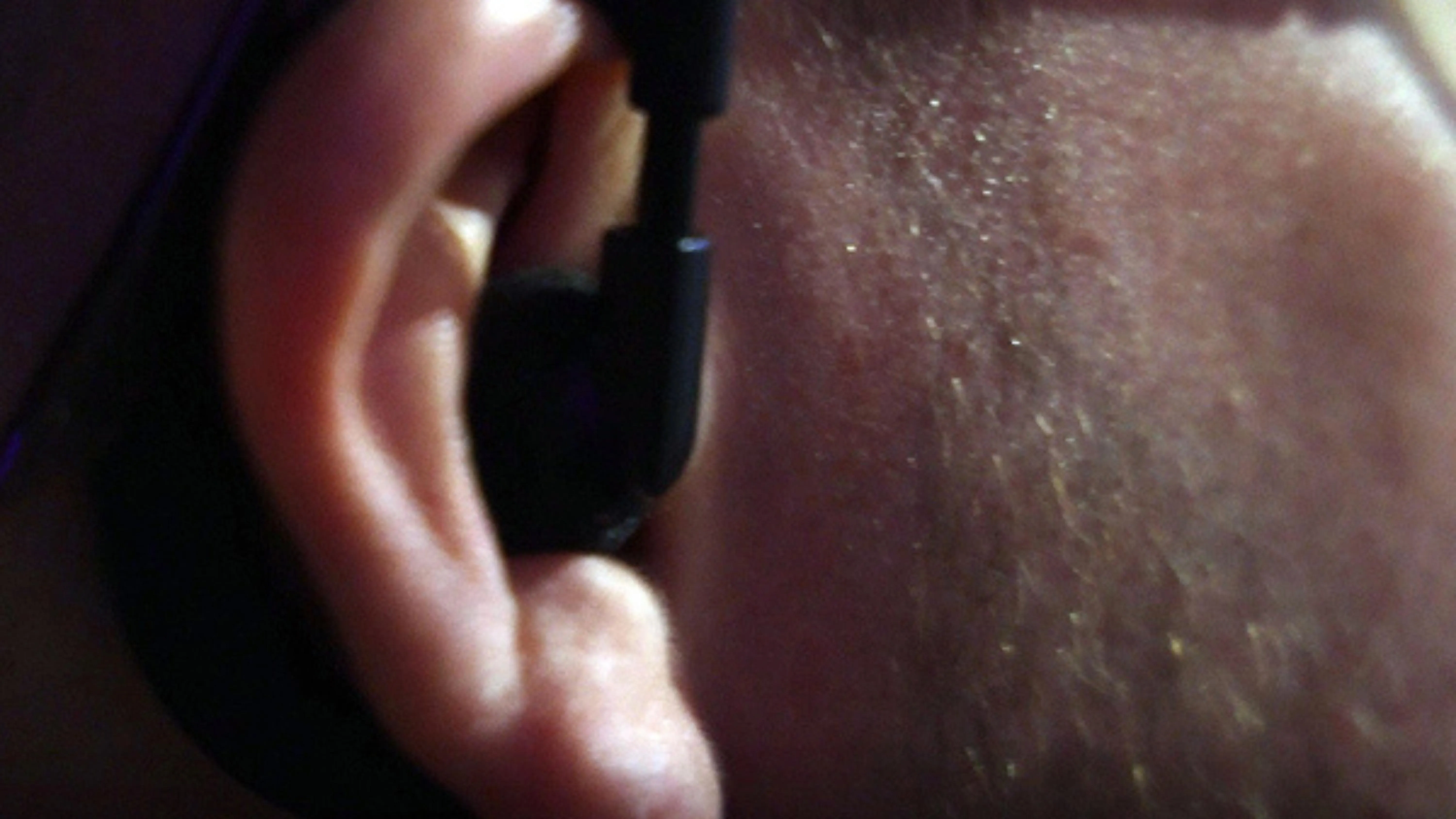 Police Officer with earpiece in