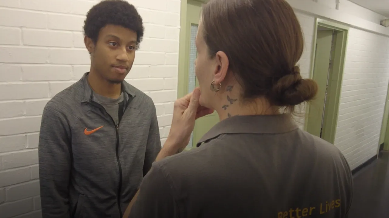 An inmate at Ranby prison speaks to a support worker from Ingeus