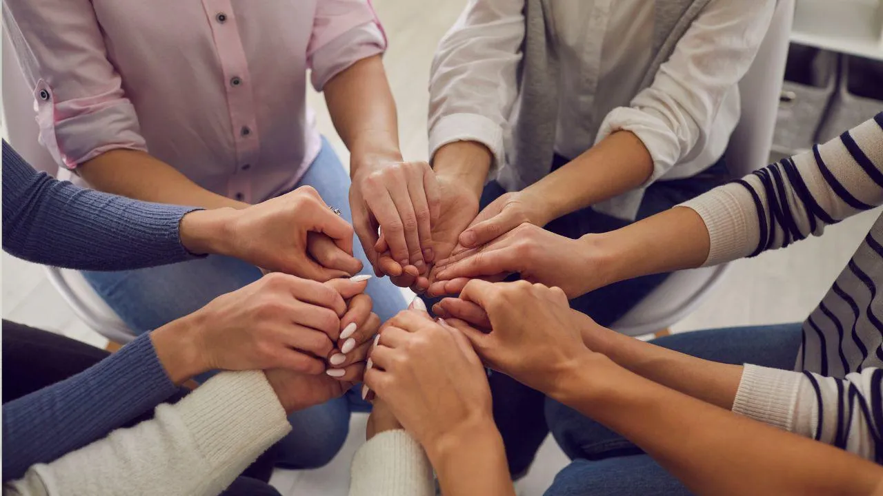 A group of hands displaying togetherness