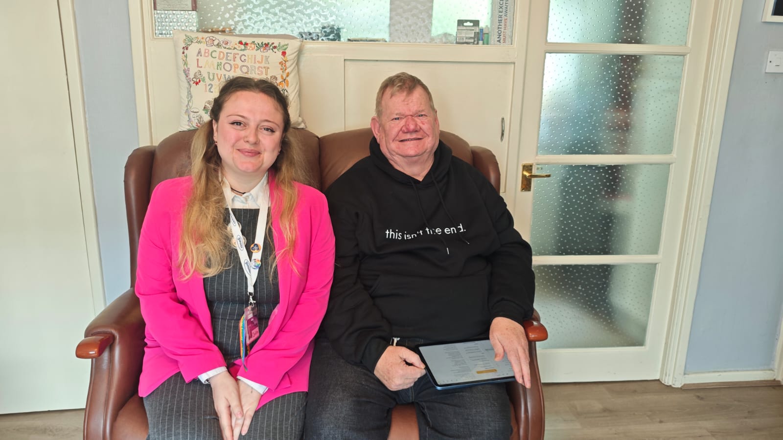 Colin Thompson alongside a member of staff from Nottinghamshire Victim CARE
