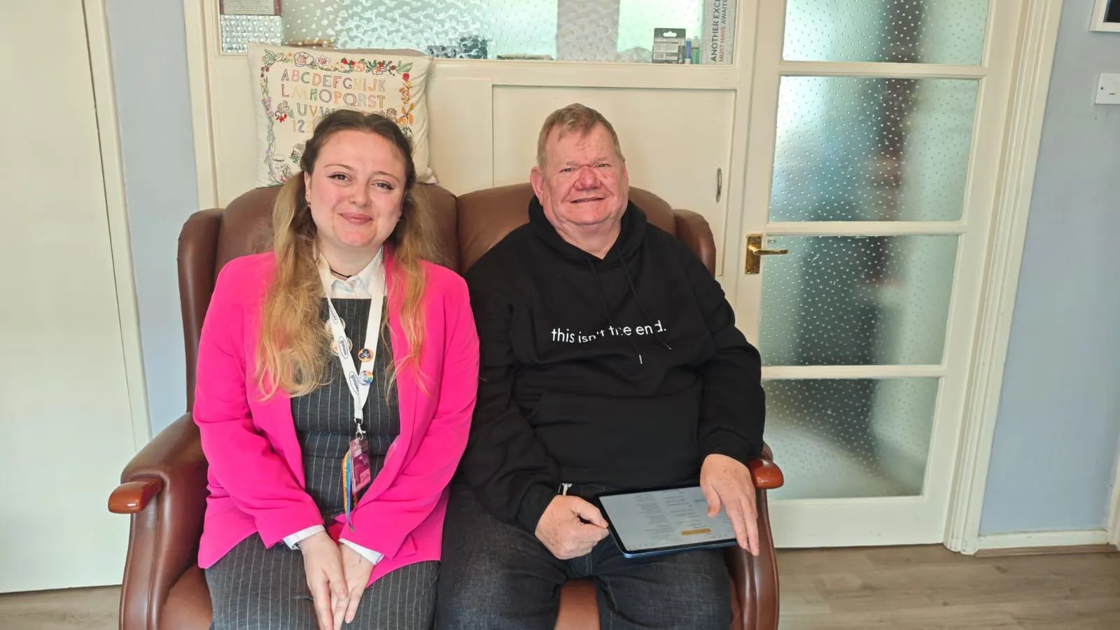 Colin Thompson alongside a member of staff from Nottinghamshire Victim CARE