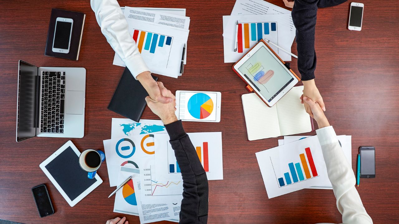 Shaking hands across a table