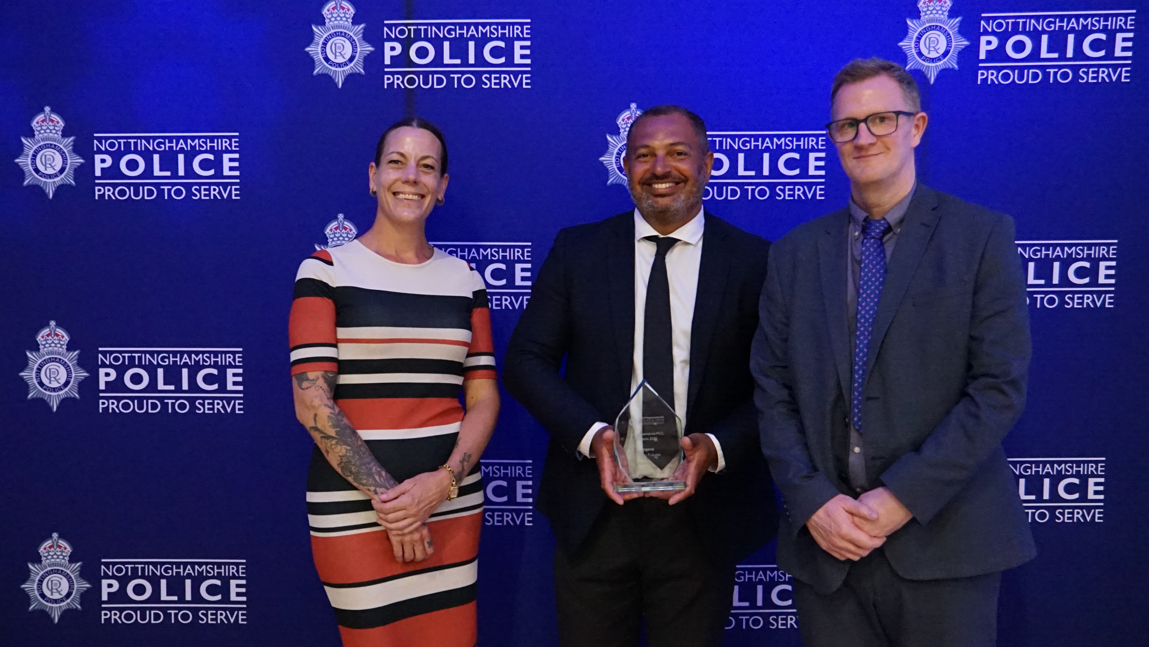 PCC Gary Godden presents the Young Futures Award to Katie Van Den Brink and James Foreman, of Ingeus