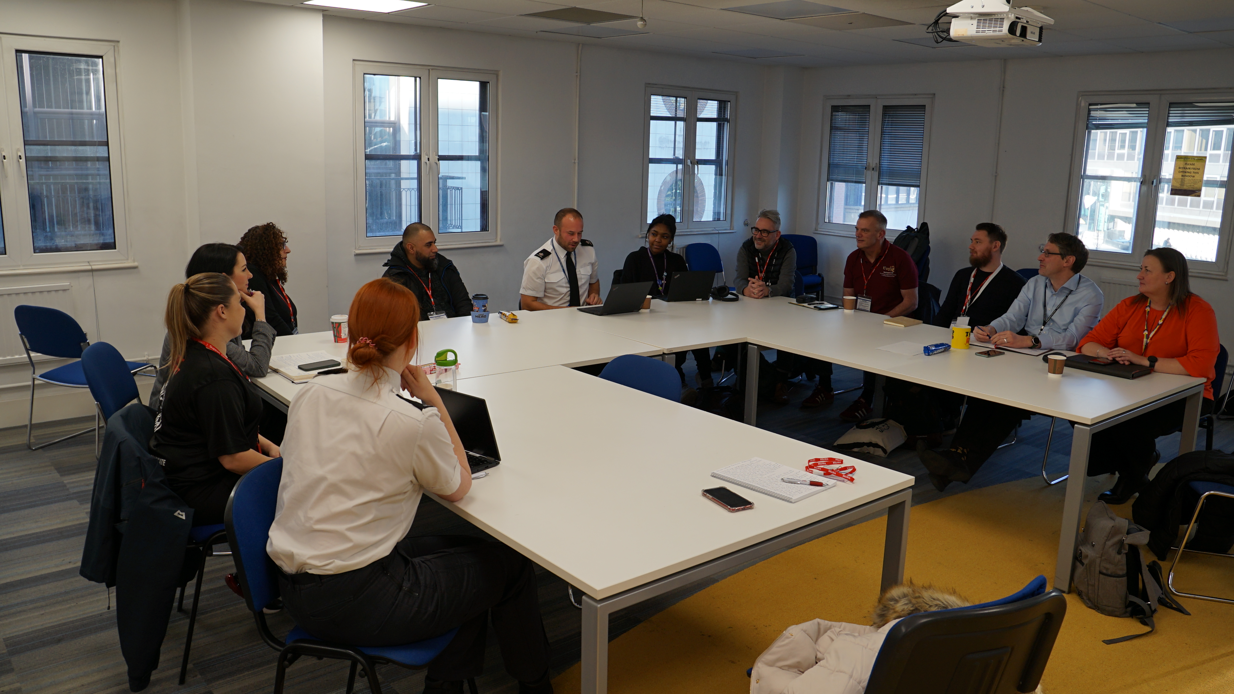 A picture of a stakeholder meeting with service providers.