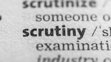 Generic image of dictionary definition of scrutiny.