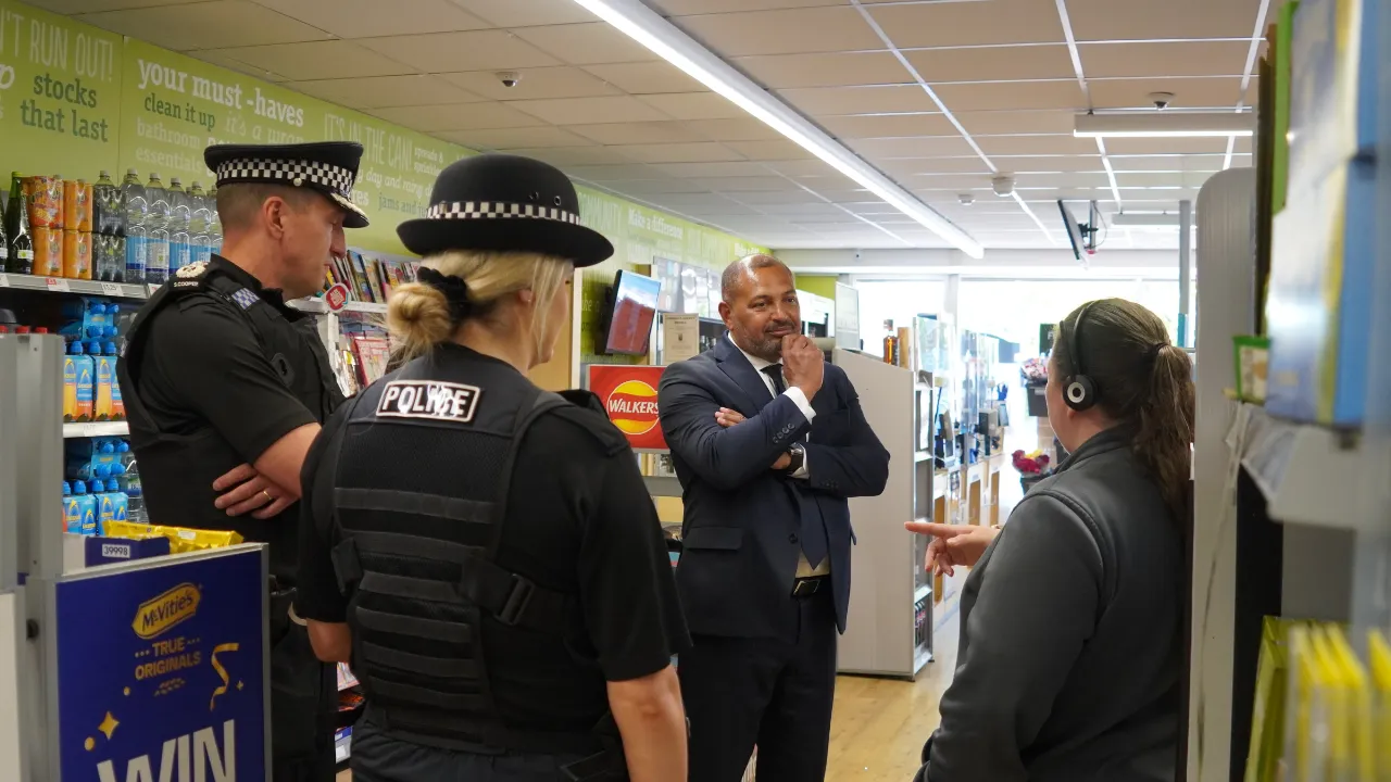 PCC Godden speaks to a shop worker