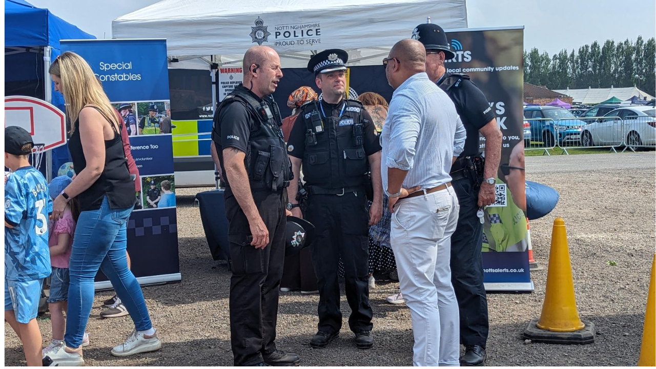 PCC speaking with Nottinghamshire Police Officers at county show.